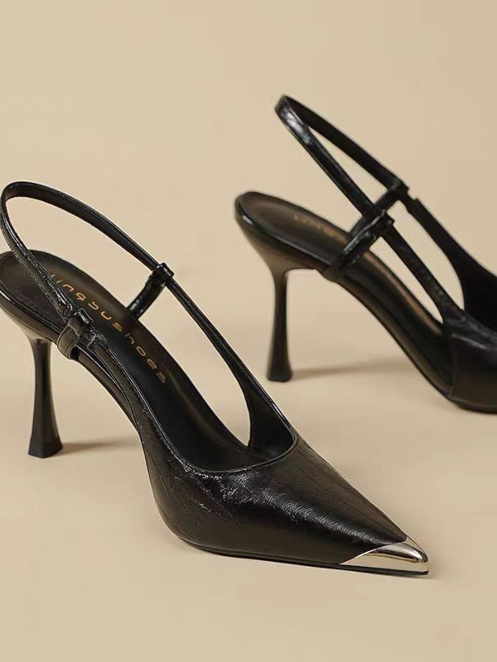 Sleek Black Slingback Heels with Silver Toe Accent